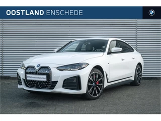 BMW i4 eDrive35 M Sport / Schuif-kanteldak / Achteruitrijcamera / Comfort Access / Harman Kardon / Stoelverwarming / Widescreen Display