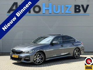 BMW 3 Serie 330i High Executive M Sport Schuif-/ Kanteldak 19 Inch Wegklapbare trekhaak Achteruitrijcamera Carplay Stoelverwarming