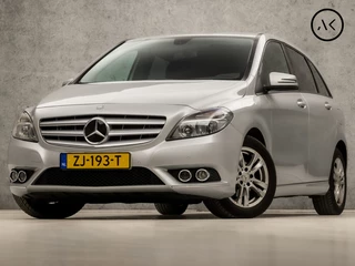 Hoofdafbeelding Mercedes-Benz B-Klasse Mercedes-Benz B-Klasse 180 Prestige Sport (NAVIGATIE, GETINT GLAS, STOELVERWARMING, PARKEERSENSOREN, NIEUWE APK, SPORTSTOELEN, BLUETOOTH, ELEK PAKKET, NIEUWSTAAT)