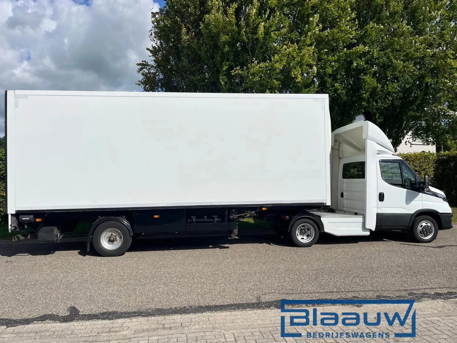 Hoofdafbeelding Iveco 40C18 Be trekker + Be bloemen oplegger