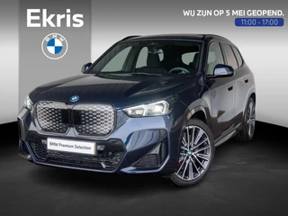 BMW iX1 eDrive20 | M Sportpakket Pro | Travel Pack | Comfort Access | Harman-Kardon | Achteruitrijcamera | Panoramadak | Stoelverwarming | 20''