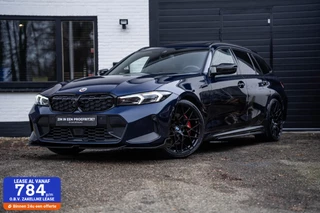 BMW 3-serie Touring 330e M Pano H&K Carbon INDIVIDUAL 20''