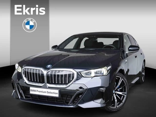 BMW 5 Serie Sedan 530e M Sportpakket / 20 inch / Glazen panoramadak / Verwarmde stoelen voor en achter / Harman Kardon