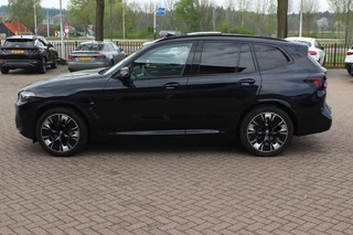 BMW iX3 High Executive 80 kWh / SoH 95,6% / Trekhaak / Panoramadak / 360Camera / Head-up / 20'' / Leder / Harman Kardon / Sfeerverlichting / Dodehoek / DAB / Stoelverwarming / ACC