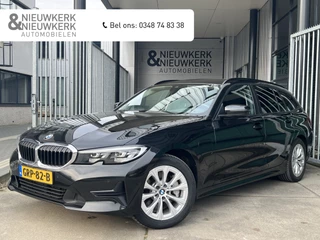 Hoofdafbeelding BMW 3 Serie BMW 3 Serie Touring Hybride 330e | AUTOMAAT | CARPLAY/ANDROID | CAMERA | NAVI | CRUISE CONTROL | CLIMATE CONTROL | PDC V+A | LMV | STOELVERWARMING | ELEKTR. ACHTERKLEP | LICHT+REGEN SENSOR | LED | BLUETOOTH