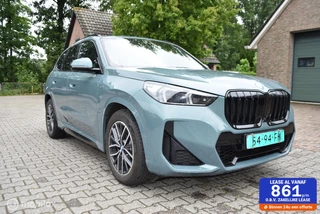 BMW X1 2.5 E  Aut  Hybrid M Sportpakket Cape York green met