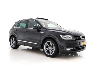 Hoofdafbeelding Volkswagen Tiguan Volkswagen Tiguan 1.5 TSI ACT Highline Business R-Line-Sport-Pack Aut. *PANO | ADAPT.CRUISE | DIGI-COCKPIT | MICROFIBRE | SURROUND-VIEW | KEYLESS | NAVI-FULLMAP | DAB+ | SHIFT-PADDLES | TOWBAR | LANE-ASSIST | ERGONOMIC-SPORT-SEATS | 19''ALU *