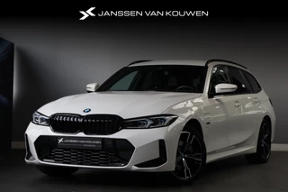 BMW 3-serie Touring 320e xDrive PHEV SOH 100% M Sport Stoelverwarming Parking Pack Adaptief LED