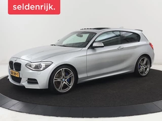 BMW 1-serie M135i xDrive High Executive | Schuifdak | Leder |  Stoelverwarming | Memory | Bi-Xenon | Parkeerhulp | Climate control | Sportstoelen | Bluetooth | Cruise control | M Sport