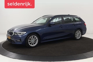 Hoofdafbeelding BMW 3 Serie BMW 3-serie 318i Business Edition | Stoelverwarming | Camera |  Carplay | Live Cockpit | Full LED | Navigatie | Dodehoek detectie | Climate control