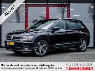 Volkswagen Tiguan 1.4 TSI Comfortline Business | Trekhaak | Navigatie | Climate Control | Adaptieve Cruise Control | 18'' Sebring Lichtmetalen Velgen | R-Line Stuurwiel | Privacy Glas | Apple Carplay | Andoid Auto | Elektrische Kofferklep |