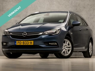 Opel Astra Sports Tourer 1.4 Sport 150Pk (APPLE CARPLAY, GROOT NAVI, CLIMATE, STUUR/STOELVERWARMING, SPORTSTOELEN, CAMERA, TREKHAAK, PARKEERSENSOREN, NIEUWSTAAT)