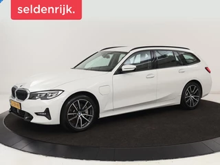 BMW 3-serie 330e Sport Line | Stoelverwarming | Adaptive cruise | Sportstoelen | Sfeerverlichting | Navigatie | Full LED | Half leder | Live Cockpit | Parkeerhulp | Climate control | PHEV | Plug In