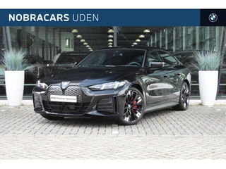 BMW i4 eDrive35 Gran Coupé M Sport / M Adaptief onderstel / Verwarmd stuurwiel / Harman Kardon / Live Cockpit Plus / Widescreen Display / Parking Assistant / Active Cruise Control