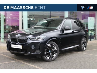 Hoofdafbeelding BMW iX3 BMW iX3 High Executive 80 kWh / Sportstoelen / Trekhaak / Stoelverwarming / Adaptief M Onderstel / Head-Up / Harman Kardon / Parking Assistant Plus