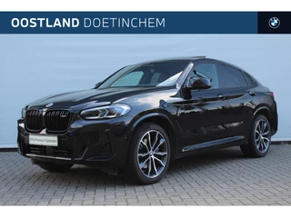 Hoofdafbeelding BMW X4 BMW X4 M40i High Executive Automaat / Trekhaak / Panoramadak / Sportstoelen / Comfort Access / Laserlight / Head-Up / Harman Kardon / Getint glas