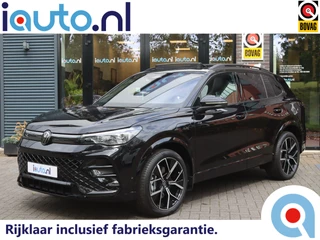 Hoofdafbeelding Volkswagen Tiguan Volkswagen Tiguan 1.5 eHybrid 272pk R-Line Black Style Pano/IQ.Light/Camera/Keyless/ACC/DCC/ErgoActive/Dodehoek/20"/Trekhaak wegkl.