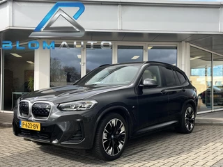 Hoofdafbeelding BMW iX3 BMW iX3 M-SPORT 80 kWh PANO+360+ACC+EL TREKH+HARMAN KARDON