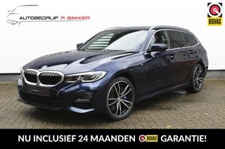 BMW 3-serie Touring 330e xDrive M-Sport // Tanzanite Blue - LASER LED - Trekhaak - Leder - Camera - HUD - Android Auto & Apple CarPlay