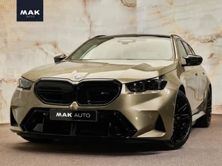 Hoofdafbeelding BMW M5 BMW M5 Touring V8 M Hybrid, Sonderlackierung, Ultimate Package, ceramic, pano, B&W, 21", stl.ventilatie, memory, carbon, leder, privacy