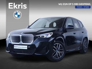 BMW iX1 xDrive30 67 kWh / M-Sport Pakket / Achteruitrij Camera / PDC / Verwarmde Voorstoelen / 18'' LM / Getint Glas Achter /