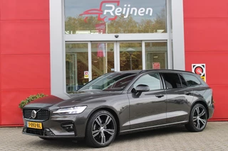 Volvo V60 2.0 B4 211PK PLUS DARK |19" 5-MULTI SPAAKS BLACK DIAMOND CUT LICHTMETALEN VELGEN  | PILOT ASSIST | REMOTE START | APPLE CARPLAY / ANDROID AUTO | NAVIGATIE BY GOOGLE | DRAADLOZE TELEFOONLADER | PARK ASSIST - ACHTERUITRIJCAMERA EN PAKEERSENSOREN VOOR + ACHTER |  ADAPTIEVE CRUISECONTROL | R-DESIGN BEKLEDING MET NAPPA LEDER I.C.M. OPEN GRID TEXTIEL | POWERSEATS - BEIDE VOORSTOELEN ELEKTRISCH VERSTELBAAR MET GEHEUGENFUNCTIE | STOELVERWARMING | SFEERVERLICHTING | LIGHTING PACK - FULL LED KOPLAMPEN MET ACTIEF GROOTLICHT EN KOPLAMPSPROEIERS | LED MISTLAMPEN | INTELLSAFE SURROUND MET O.A. DODEHOEK BEWAKING | 4 ZONE ELECTRONIC CLIMATE CONTROL MET TOUCHSCREENBEDIENING ACHTER | ELEKTRISCH BEDIENBARE ACHTERKLEP | VOLVO HIGH PERFORMANCE AUDIO | GLANZEND ZWARTE RAAMOMLIJSTING EN SPIEGELKAPPEN | GLANZEND ZWARTE DAKRAILS EN GRILLE | VOOR EN ACHTERBUMPER IN SPORTUITVOERING | EXTRA GETINTE RUITEN ACHTER | ZWARTE HEMELBEKLEDING |