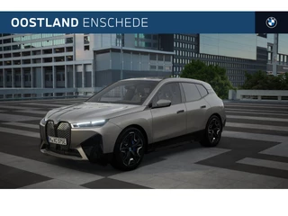 Hoofdafbeelding BMW iX BMW iX xDrive50 High Executive / Sportpakket / Panoramadak Sky Lounge / Trekhaak / Laserlight / Multifunctionele Stoelen / Soft-Close / Active Steering