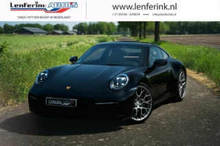 Hoofdafbeelding Porsche 911 Porsche 911 3.0 Carrera 4 Sportuitlaat - Apple Carplay - Android Auto - LED - Stoelverwarming - Camera