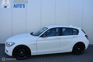 BMW 114i Urban Line Alpinweiss Xenon Clima Cruise Carplay 18" LMV Camera ½Leder Zeer mooi!