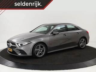 Hoofdafbeelding Mercedes-Benz A-Klasse Mercedes-Benz A-klasse 180d AMG | 36.600km NAP | Panoramadak | Stoelverwarming | Carplay | Camera | Full LED | Navigatie | Leder/Alcantara | Widescreen