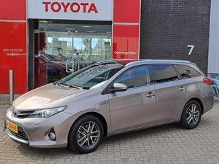 Hoofdafbeelding Toyota Auris Toyota Auris Touring Sports 1.8 HYBRID LEASE NAVI STOELVERWARMING PANORAMADAK PARK-SENSOREN TREKHAAK CAMERA CRUISE PRIVACY-GLASS