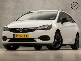Opel Astra Sports Tourer 1.2 Sport (APPLE CARPLAY, NAVIGATIE, CLIMATE, CAMERA, ADAPTIVE CRUISE, SPORTSTOELEN, GETINT GLAS, LEDER, TREKHAAK, NIEUWSTAAT)
