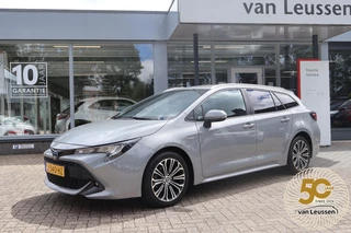 Toyota Corolla Touring Sports 1.8 HYBRID DYNAMIC KEYLESS STOELVERW. DRAADLOZE TEL. LADER ALL-SEASON PAS.STOEL IN HOOGTE VERSTELBAAR APPLE/ANDROID