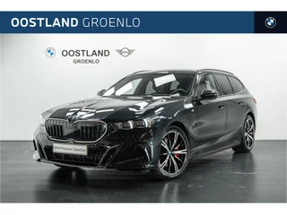 Hoofdafbeelding BMW 5 Serie BMW 5 Serie Touring 550e xDrive M Sport Automaat / Adaptief onderstel professional / Stoelventilatie / Comfortstoelen / Comfort Access / Adaptieve LED / Parking Assistant Plus / Harman Kardon