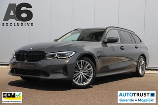 BMW 3-serie Touring 330e Business Edition Plus 292PK Black Pack Individual Automaat Trekhaak Sportstoelen Leder 18 inch Laser LED Navigatie Carplay Clima Cruise Stoelverwarming SOH 92%