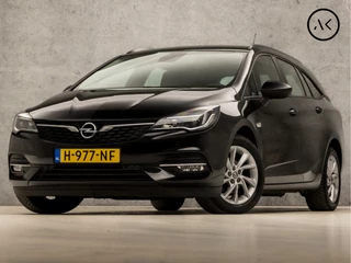 Hoofdafbeelding Opel Astra Opel Astra Sports Tourer 1.2 Sport (APPLE CARPLAY, NAVIGATIE, CAMERA, CLIMATE, CRUISE, SPORTSTOELEN, PARKEERSENSOREN, NIEUWE APK, NIEUWSTAAT)