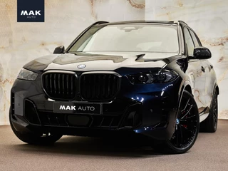 Hoofdafbeelding BMW X5 BMW X5 xDrive50e M Sport Pro, M Stoelen, B&W, 4-wielbest, pano, carbon, massage, volleder Merino, memory, luchtv., 22", HUD, tr.haak, privacy, NP144k