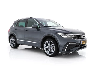 Hoofdafbeelding Volkswagen Tiguan Volkswagen Tiguan 1.4 TSI R-Line Business+ (Plug-in) (INCL-BTW) Aut. *PANO | FULL-LED | ADAPTIVE-CRUISE | DIGI-COCKPIT | HEATED-COMFORTSEATS | NAV-FULLMAP | DAB+ | TOWBAR | PRIVACY-GLASS | ECC | PDC | 19''ALU
