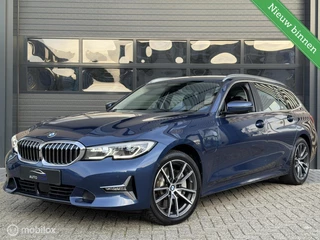 BMW 3-serie Touring 330e xDrive | Laser | HUD | 360 | Memory