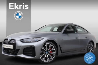 Hoofdafbeelding BMW i4 BMW i4 M50 High Executive Model M Sport / Harman Kardon / Schuif-Kanteldak / 20" LMV / M-Sportstoelen / Co-Pilot Pack / Stoelverwarming / Stuurwielrandverwarming