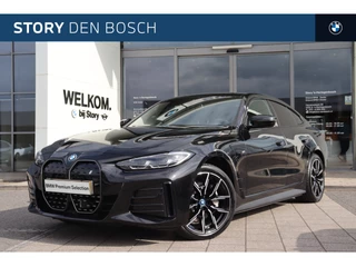 Hoofdafbeelding BMW i4 BMW i4 eDrive40 High Executive M Sport / Achteruitrijcamera / Stoelverwarming / Cruise Control / Ambiance verlichting
