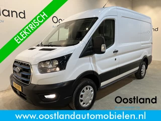 Ford E-Transit 390 (3500 kg) L2H2 Trend 68 kWh / 100% Elektrisch !! / Airco / Cruise Control / CarPlay / Camera / Navigatie / 3-Zits / 1.300 KM !!
