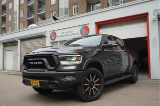 Hoofdafbeelding Dodge Ram 1500 Dodge Ram 1500 5.7 V8 4x4 Rebel Sport | Luchtvering PANO -dak | Black Line | Off Road | Groot Navi | Apple CarPlay | Keyless | 20inch | Harman Kardon | Full LED | LPG onderbouw |3/2026 beurt + 4x Banden  | excl BTW