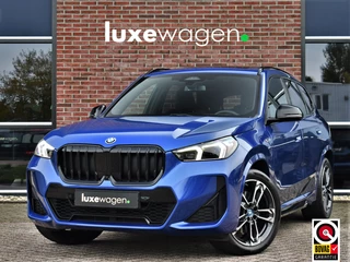 Hoofdafbeelding BMW X1 BMW X1 xDrive30e M-Sport Pano ACC Trekh HUD H/K 360-cam El-zetels