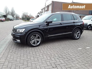 Hoofdafbeelding Volkswagen Tiguan Volkswagen Tiguan 1.4 TSI DSG ACT / R-LINE EXTERIEUR / PANORAMA