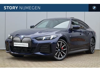 BMW i4 eDrive40 High Executive M Sport / Schuif-kanteldak / Achteruitrijcamera / Adaptieve LED / Active Cruise Control / Stuurverwarming / Comfort Access
