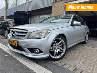 Hoofdafbeelding Mercedes-Benz C-Klasse Mercedes-Benz C-Klasse 180 K BlueEFFICIENCY AMG PAKKET CLIMA NAVI NAP APK BIJ AFLEVERING