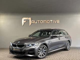 Hoofdafbeelding BMW 3 Serie BMW 3-serie Touring 320e Pano|M Sport|Memory|HuD|Sfeer|Leder