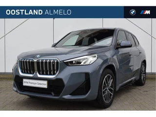 Hoofdafbeelding BMW iX1 BMW iX1 xDrive30 High Executive M Sport / Trekhaak / Sportstoelen / Stoelverwarming / Adaptief M Onderstel / Parking Assistant / Harman Kardon / Verwarmd stuurwiel