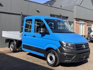 Hoofdafbeelding Volkswagen Crafter Volkswagen Crafter 35 2.0 TDI DC Airco Cruise controle Euro 6 laadbak Voorruit verwarming 6-persoons Open laadbak Pick-up p-up Bakwagen 1e eigenaar